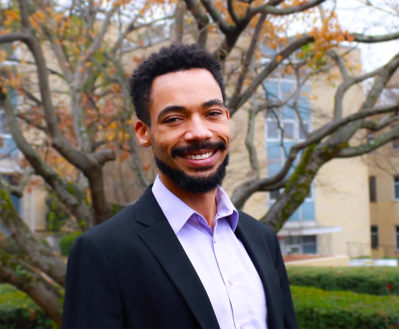 A headshot of Tayo Sanders II, Ph.D.